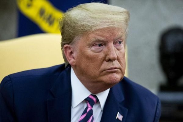 Trump menghadapi badai api setelah mengidentifikasi dugaan whistle-blower