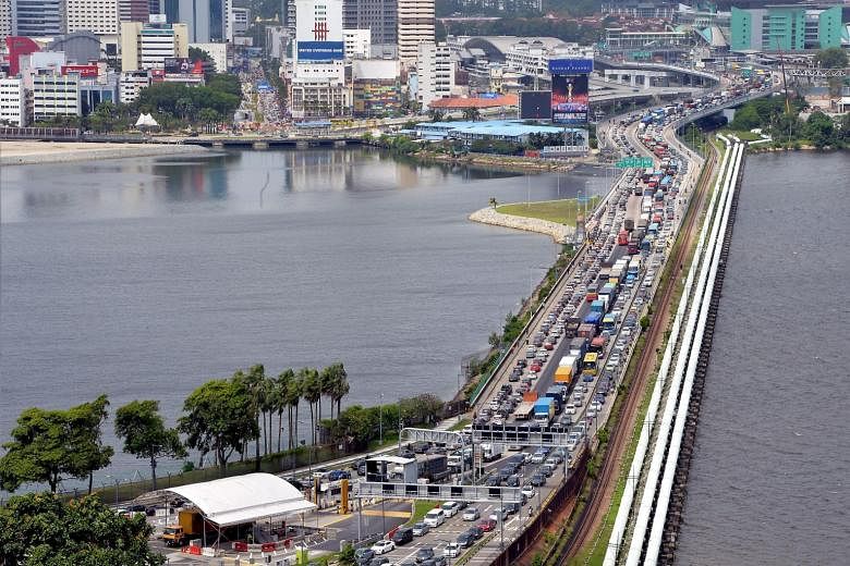 Layanan carpool Singapura-Johor: Kendaraan tanpa izin tidak dapat menyediakan layanan lintas batas, kata LTA