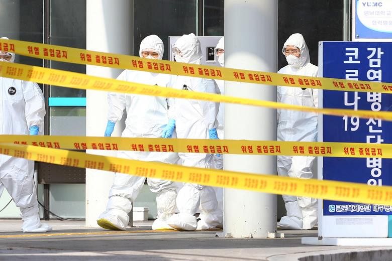 Coronavirus: Korea Selatan melancarkan ‘tanggapan habis-habisan’ terhadap virus, dengan 586 kasus baru